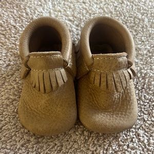 Freshly picked weathered brown moccasins